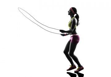 woman exercising with a skipping rope