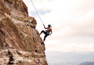 a woman rock climbing