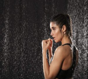 a woman working out in a shower