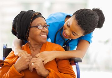 a woman getting help from a nurse