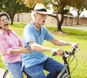 a senior couple out for a bike ride