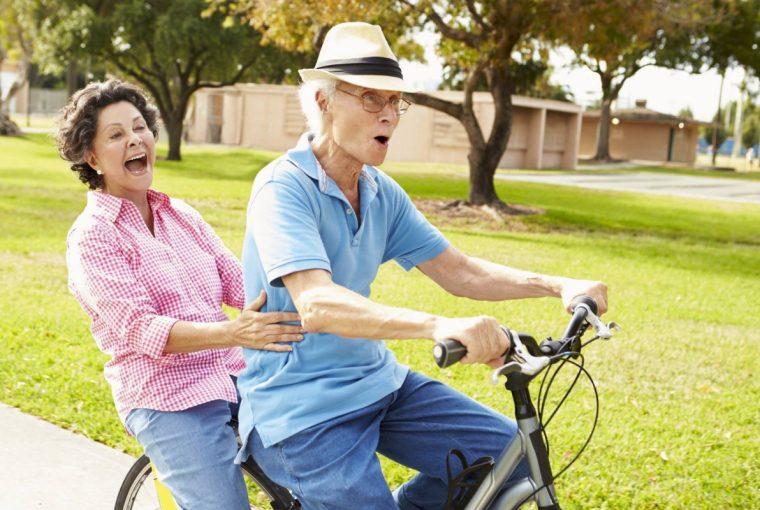 a senior couple out for a bike ride